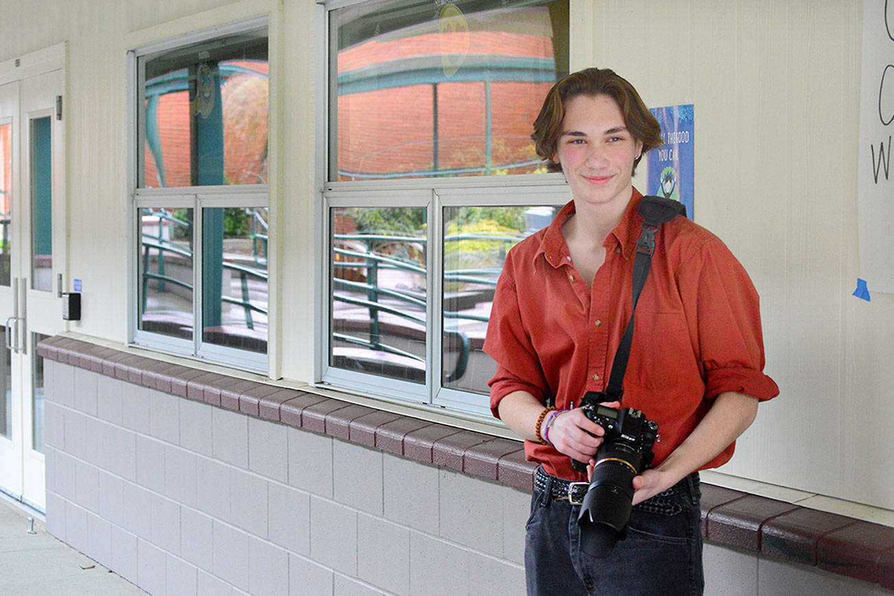 Ewen LeRest, 16, of Quilcene, has received statewide recognition for his photography, which celebrates school activities as well as the natural world. Diane Urbani de la Paz/Peninsula Daily News