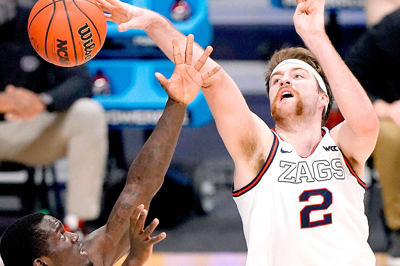 Creighton forward Damien Jefferson (23) and Gonzaga forward Drew Timme (2) battle for a loose ball in the second half of a Sweet 16 game in the NCAA men's college basketball tournament at Hinkle Fieldhouse in Indianapolis, Sunday, March 28, 2021. (AP Photo/AJ Mast)