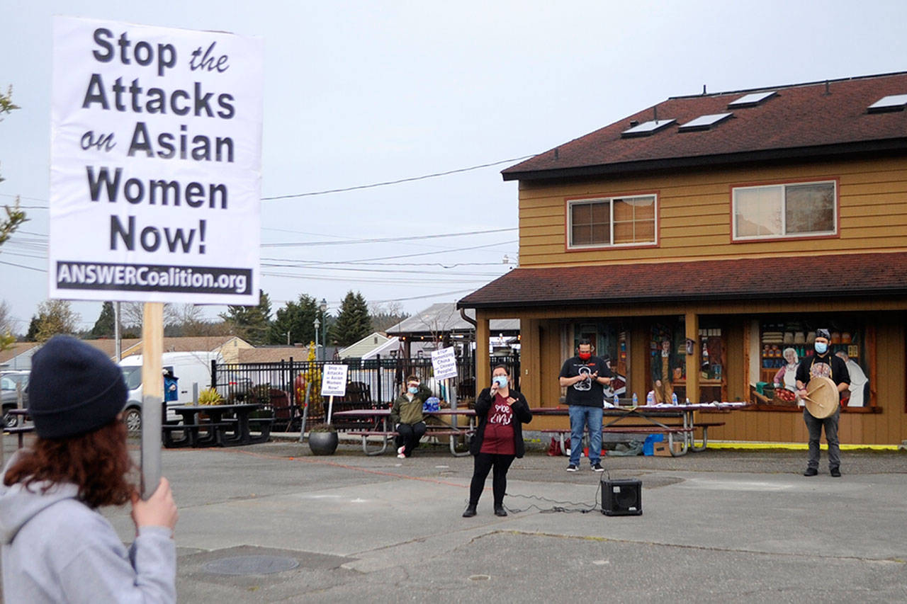 Rachel Anderson of Sequim speaks to a crowd of about 30 people about how she supports the Asian American community and how attacks on women need to stop. (Matthew Nash/Olympic Peninsula News Group)