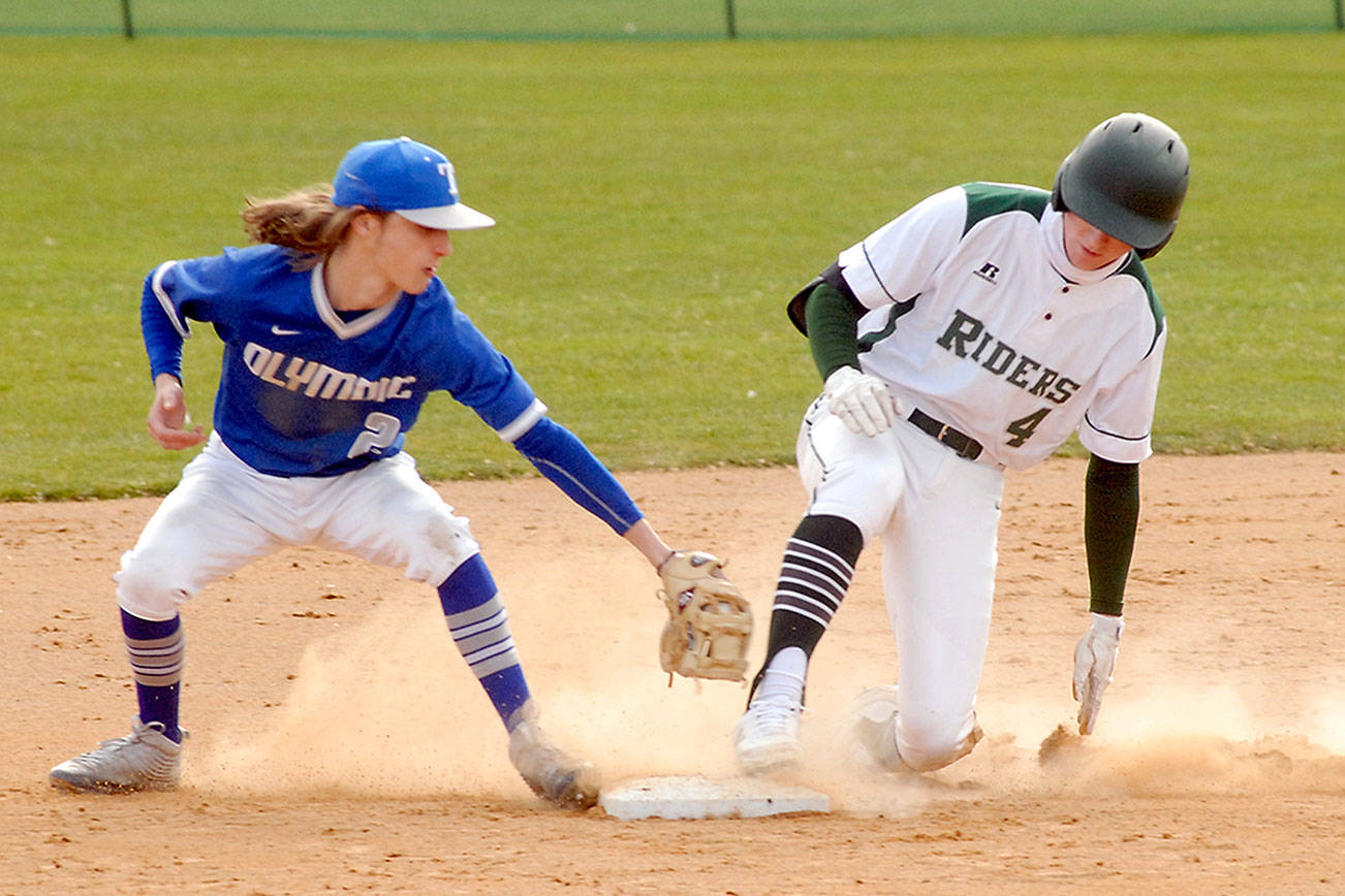 Keith Thorpe/Peninsula Daily News
Port Angeles lead-off batter Wyatt Hall, right, arrives at second ahead of the tag from the Olympic second baseman after Hall doubled in the first inning at Port Angeles Civic Field.