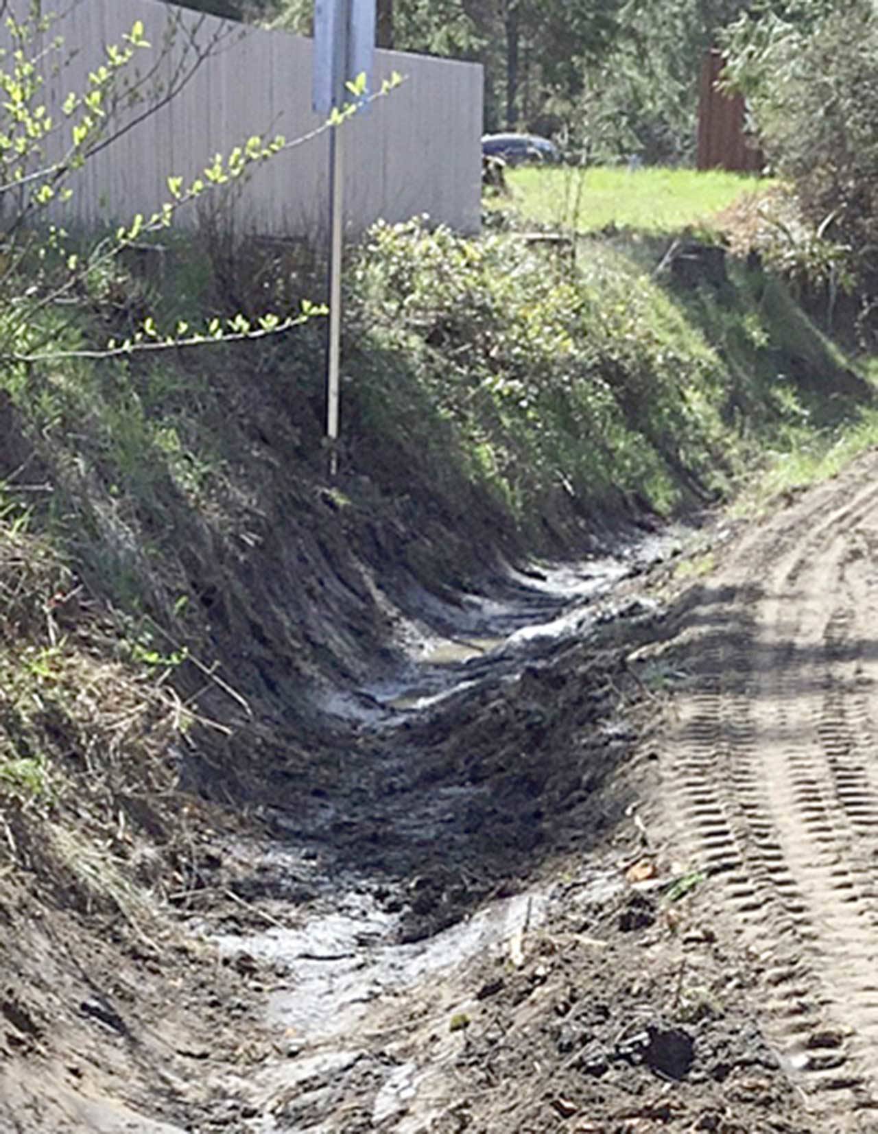 Maintenance crews from the state Department of Transportation replaced damaged guardrail and repaired some of the ditches Monday along the eastbound U.S. Highway 101 offramp to state Highway 117 in Port Angeles. The road was closed through the afternoon as drivers followed a detour via South Airport Road and West Lauridsen Boulevard. (Washington State Department of Transportation)