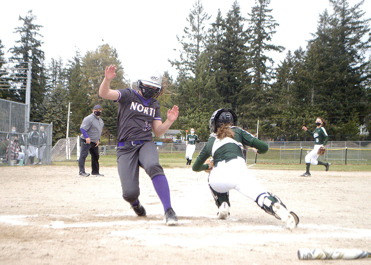 North Kitsap baserunner Kendall Becker scores past Port Angeles catcher Zoe Smithson in Poulsbo on Friday. Smithson later hit a two-run home run to help lead the Roughriders to a 6-2 win. (Pierre LaBossiere/Peninsula Daily News)
North Kitsap baserunner Kendall Becker scores past Port Angeles catcher Zoe Smithson. Smithson later hit a two-run home run. (Pierre LaBossiere/Peninsula Daily News)