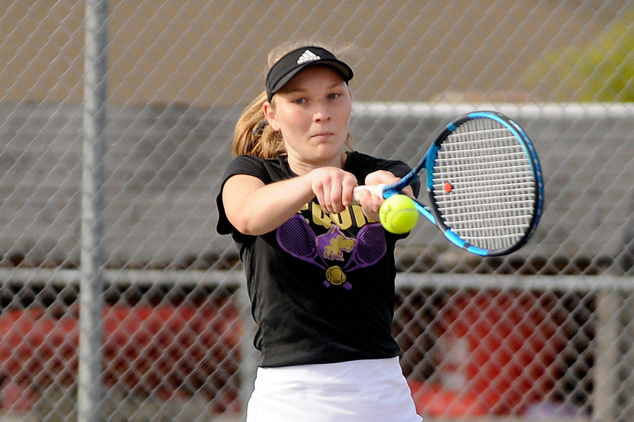 Sequim's Melissa Porter and doubles partner Allie Gale (not pictured) take on a Bremerton team in Sequim on April 21.