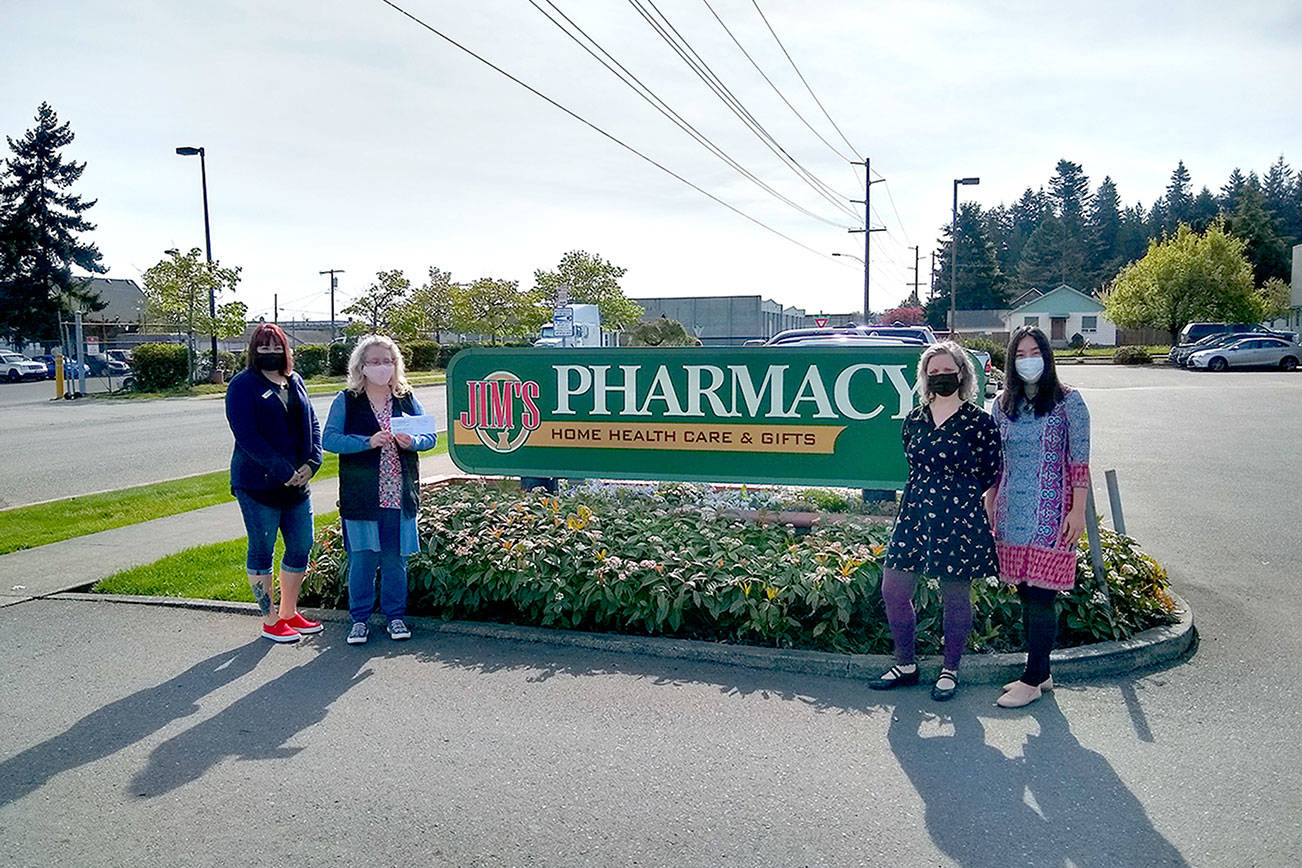 From left are Jessica Thompson, Lori Ambrose, Molly Wallace and JooRi Jun. Staff and customers at Jim’s Pharmacy in Port Angeles raised more than $700 to support Volunteer Hospice of Clallam County, the March recipient of Jim’s Cares Monthly Charity. The funds are raised through monetary donations, used book sales, donated employee casual days and a percentage of over-the-counter sales at Jim’s.