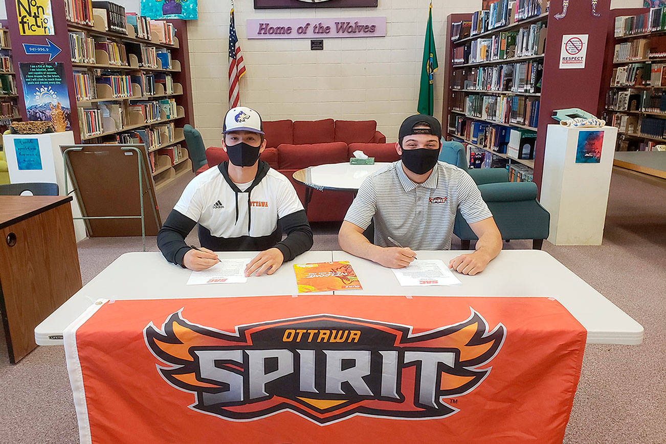 Sequim High School
Sequim seniors Michael Young, left, and Walker Ward have each signed letters of intent to continue their football careers at Ottawa University in Surprise, Ariz. Young will play wide receiver and Ward will play running back for the Ottawa Spirit in the National Christian College Athletic Association.