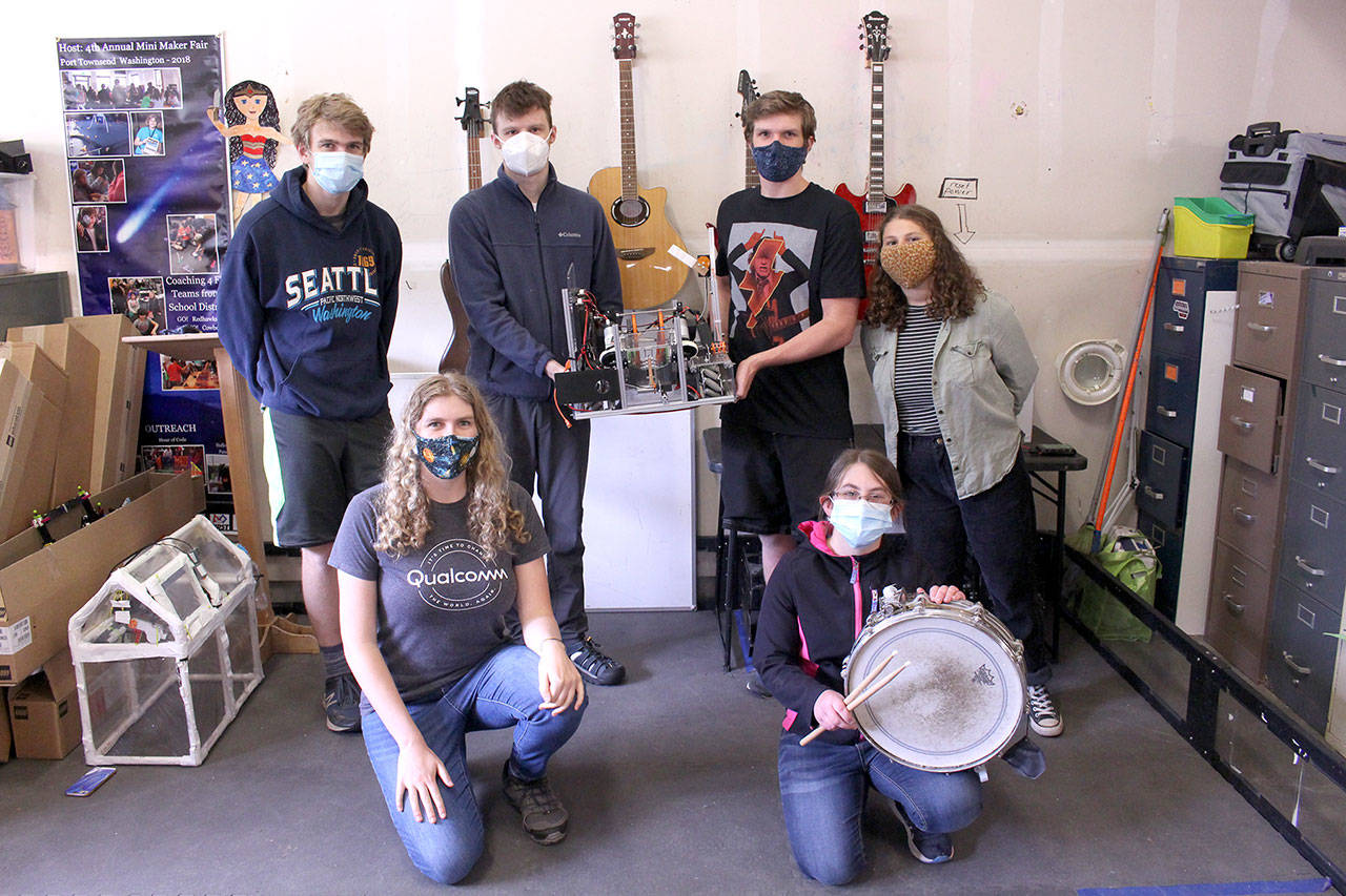 Port Townsend STEM Club members are working to garner submissions for their KPTZ radio talent show and digital time capsule of music and verbal poetry of residents 21 and younger in Jefferson County. The include, standing from left, Everest Ashford, ninth grade homeschool student; Logan Flanagan, Port Townsend High School Class of 2019; Nathaniel Ashford, 11th grade homeschool student; Adeline Gellert DePalma, 10th grade PTHS student; and, kneeling from left, Ella Ashford, class of 2019 NW STEAM Academy; and Rachel Doan, PTHS Class of 2020. The club members posed for a photo Wednesday afternoon at their lab in Port Townsend. (Zach Jablonski/Peninsula Daily News)