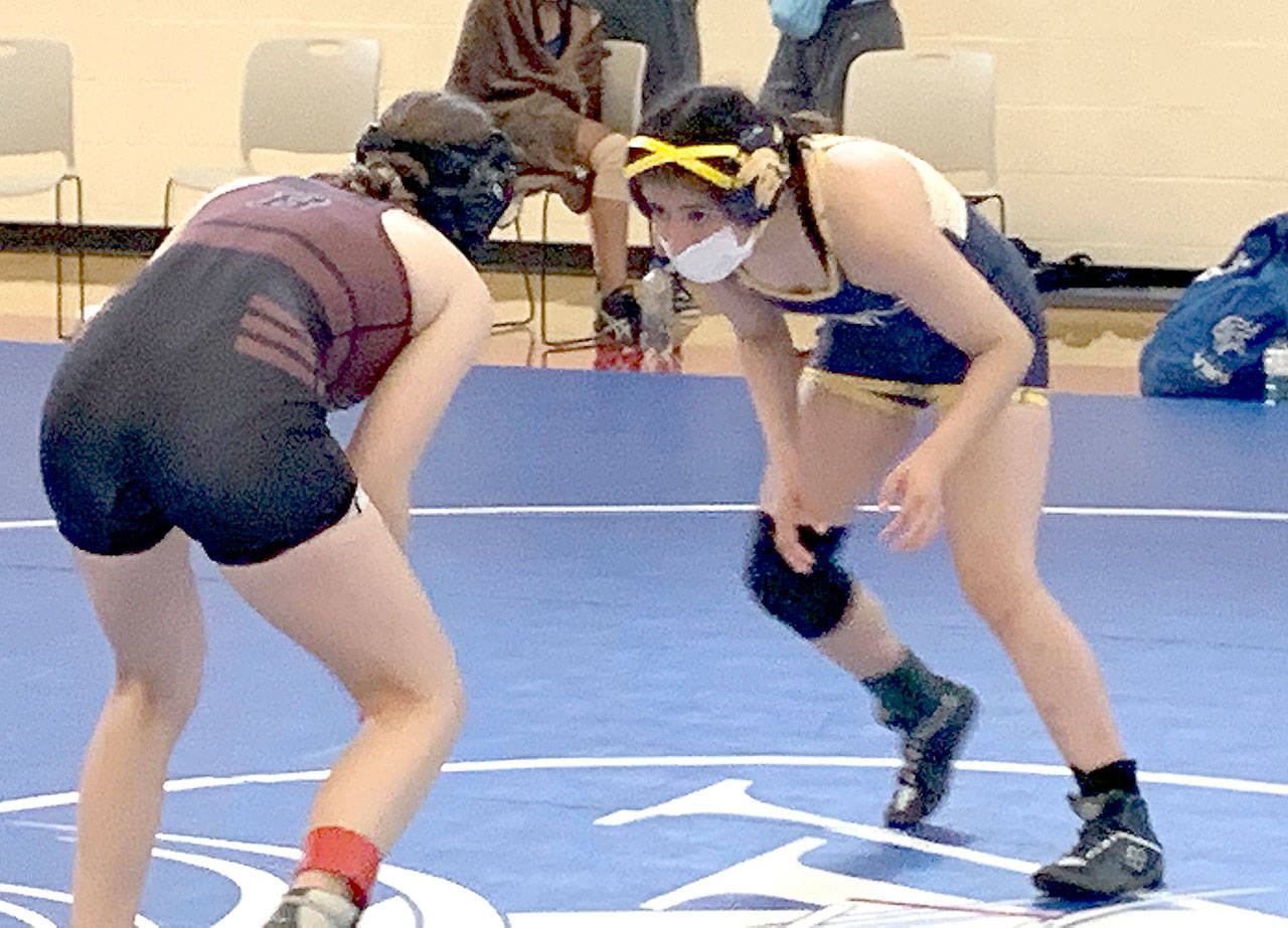 Forks’ Karen Ensastequi-Salazar wrestles in a double dual versus Curtis and Bethel high schools this weekend. (Courtesy photo)