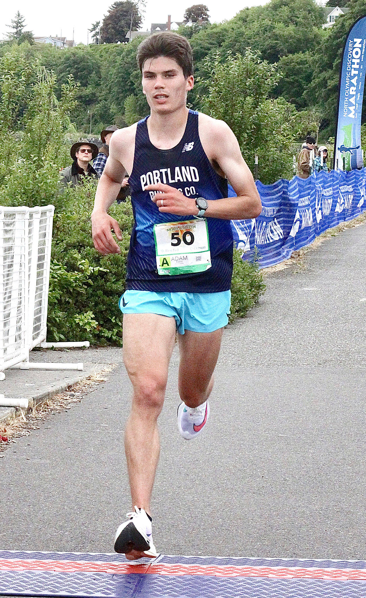 Adam Klein of Tualatin, Ore., wins the North Olympic Discovery Marathon on Sunday in 2 hours, 21 minutes, 18 seconds, nearly 14 minutes ahead of second place and 2 1/2 minutes short of a U.S. Olympic trial qualifier. (Dave Logan/for Peninsula Daily News)