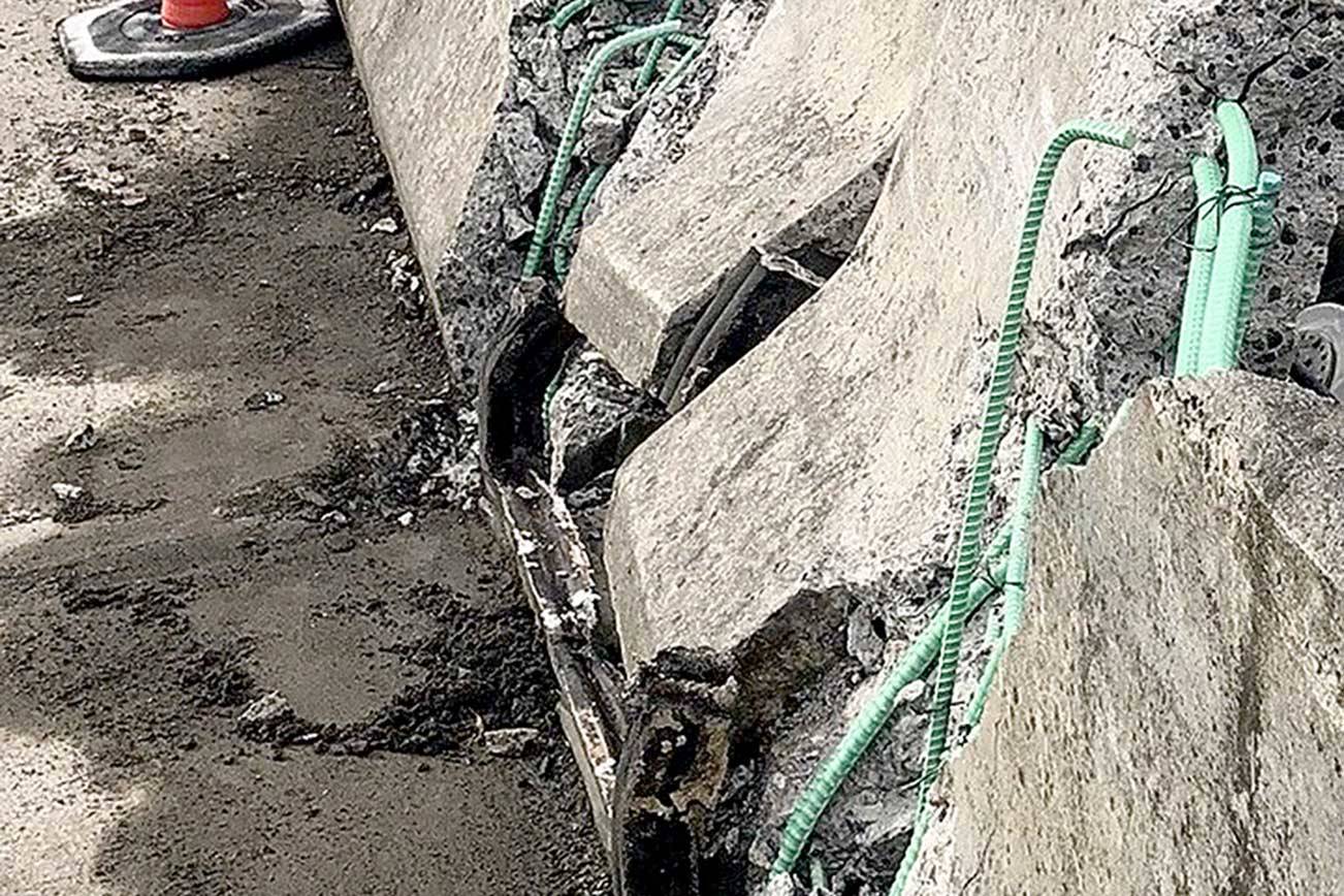 The Hood Canal Bridge was closed in both directions following an overnight or early morning collision that caused damage to the bridge. State Department of Transportation crews worked to fix the damage Wednesday afternoon. The State Patrol is investigating the incident as a hit-and-run. (Washington State Patrol)