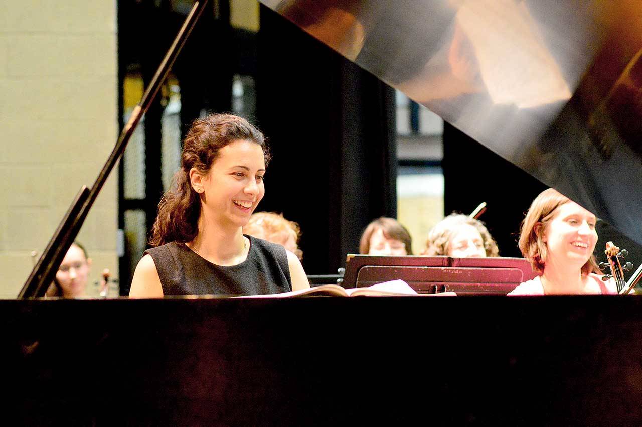 Bulgarian pianist Anna Petrova, pictured during her first rehearsal with the Port Angeles Symphony in 2017, will return for the first full concert of the orchestra’s 2021-2022 season. (Diane Urbani de la Paz/Peninsula Daily News)