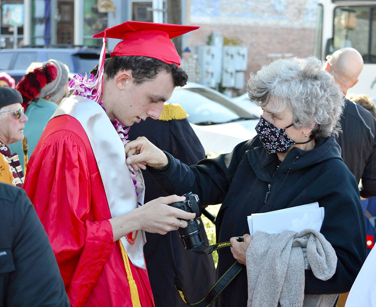 Nathalie Ballou sends her son Pierre Ballou, 19, off to graduate from Port Townsend High School on Friday night. (Diane Urbani de la Paz/Peninsula Daily News)