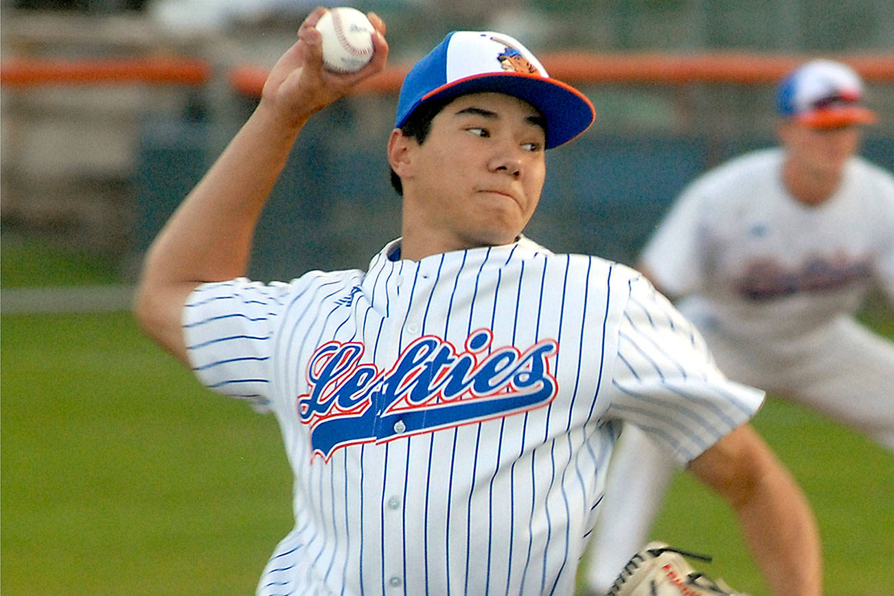 Keith Thorpe/Peninsula Daily News 
Lefties pitcher Preston Howey throws in the first inning of Tuesday night's game against the Bellingham Bells at Port Angeles Civic Field.