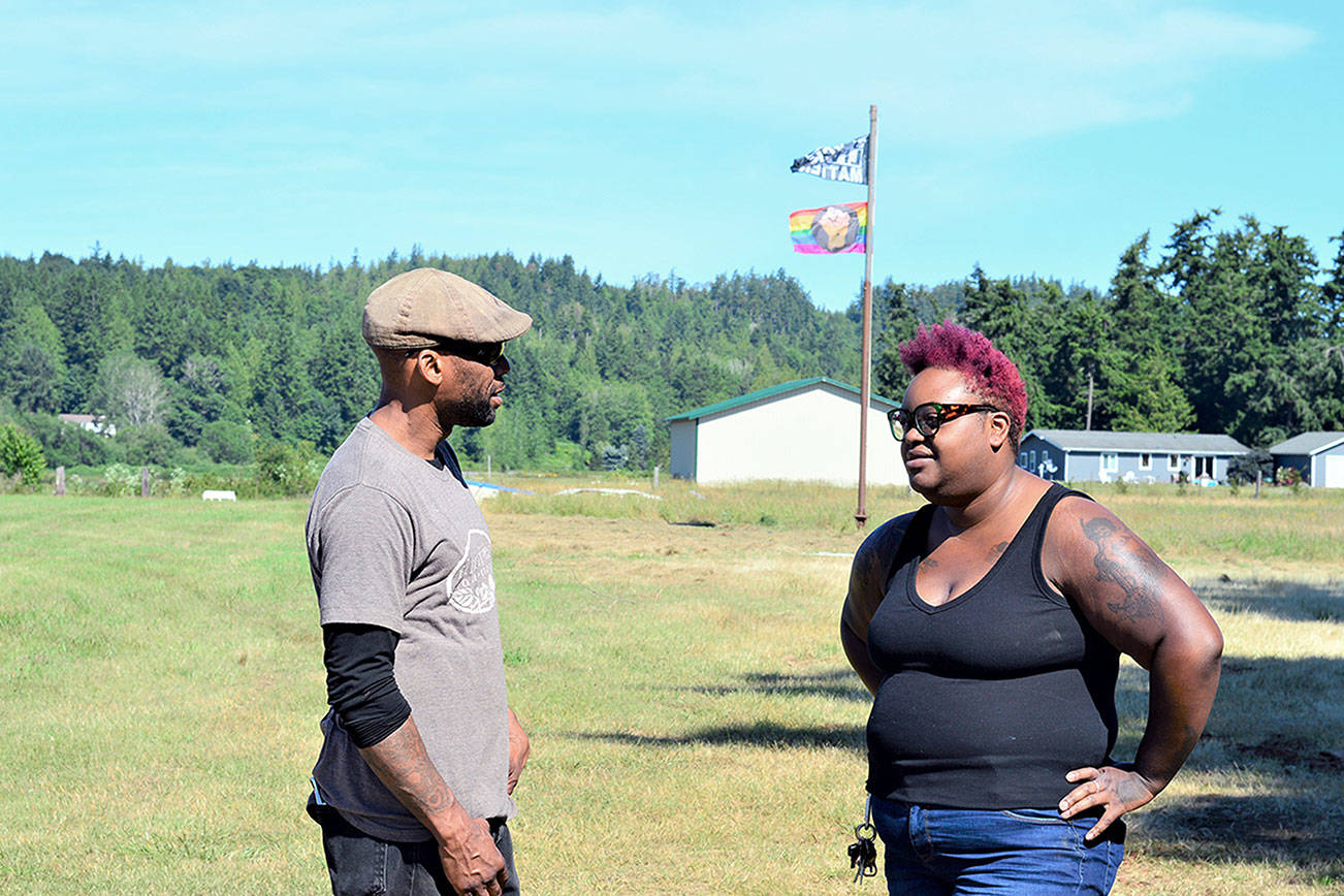 Woodbridge Farm’s Peter Mustin and singer and chef Grace Love look forward to celebrating Juneteenth at the Chimacum farm on Saturday. (Diane Urbani de la Paz/Peninsula Daily News)