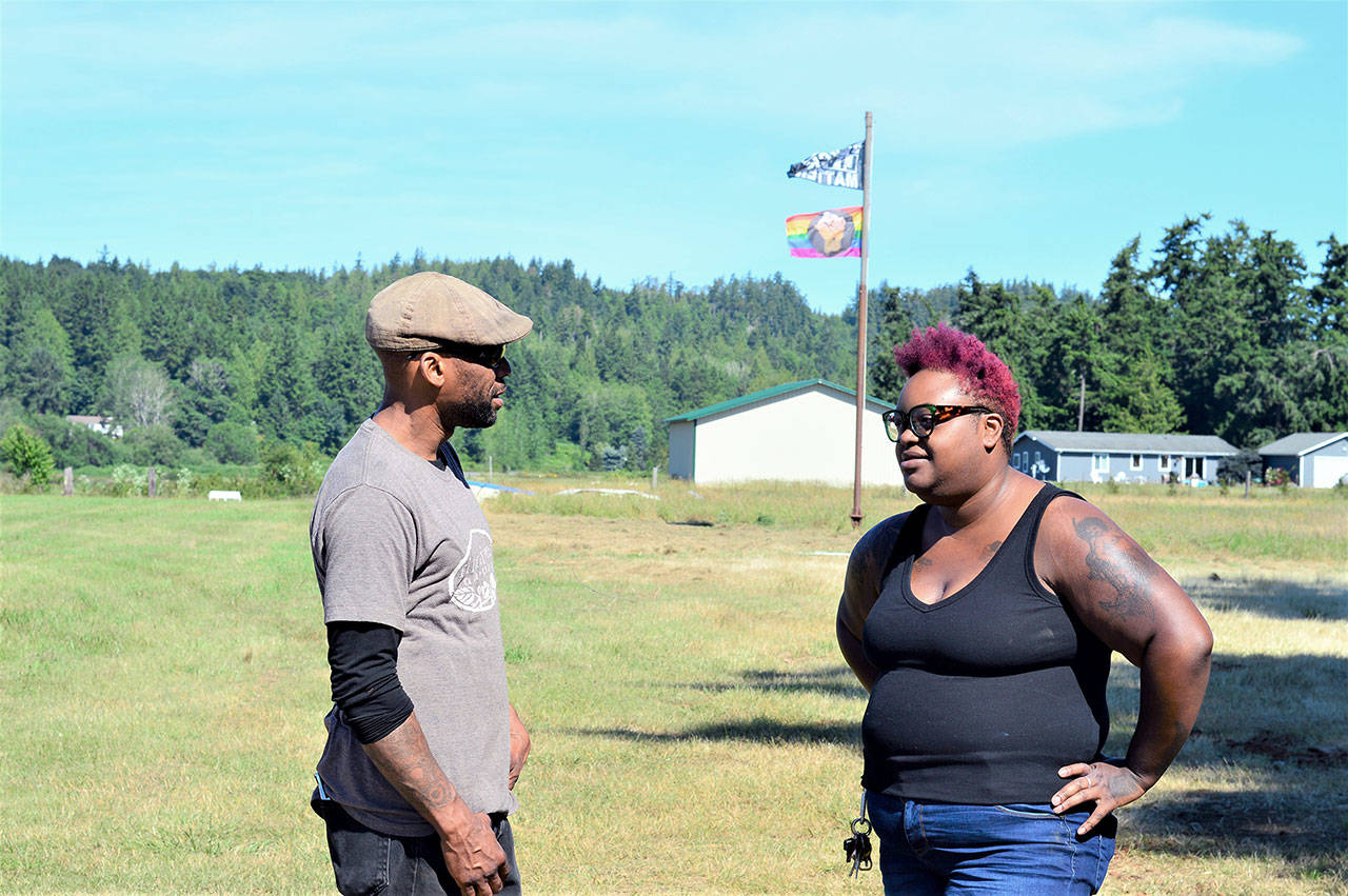 Woodbridge Farm’s Peter Mustin and singer and chef Grace Love look forward to celebrating Juneteenth at the Chimacum farm on Saturday. (Diane Urbani de la Paz/Peninsula Daily News)