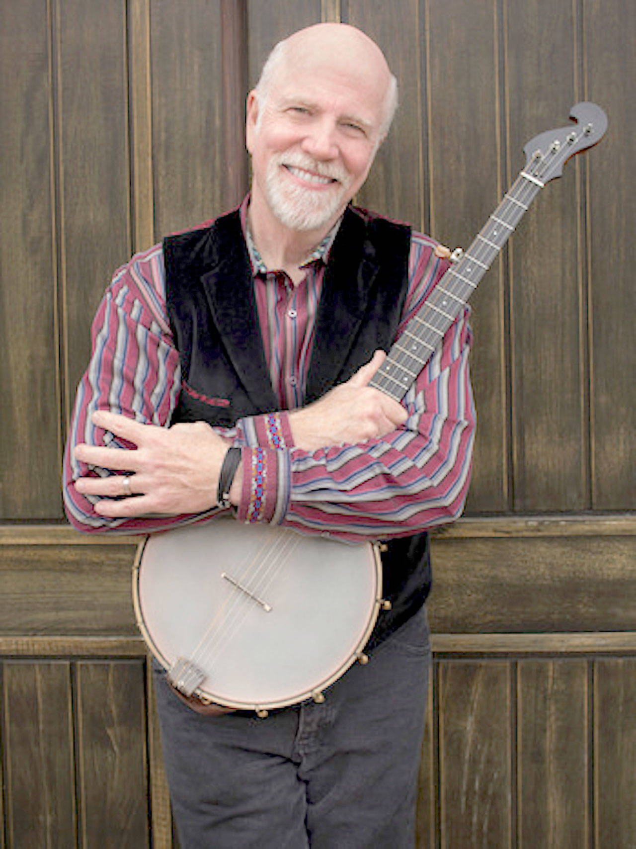 Folksinger John McCutcheon will give a live concert Sunday on the streaming platform Mandolin to benefit community radio stations including KPTZ-FM 91.9. (Photo by Irene Young)