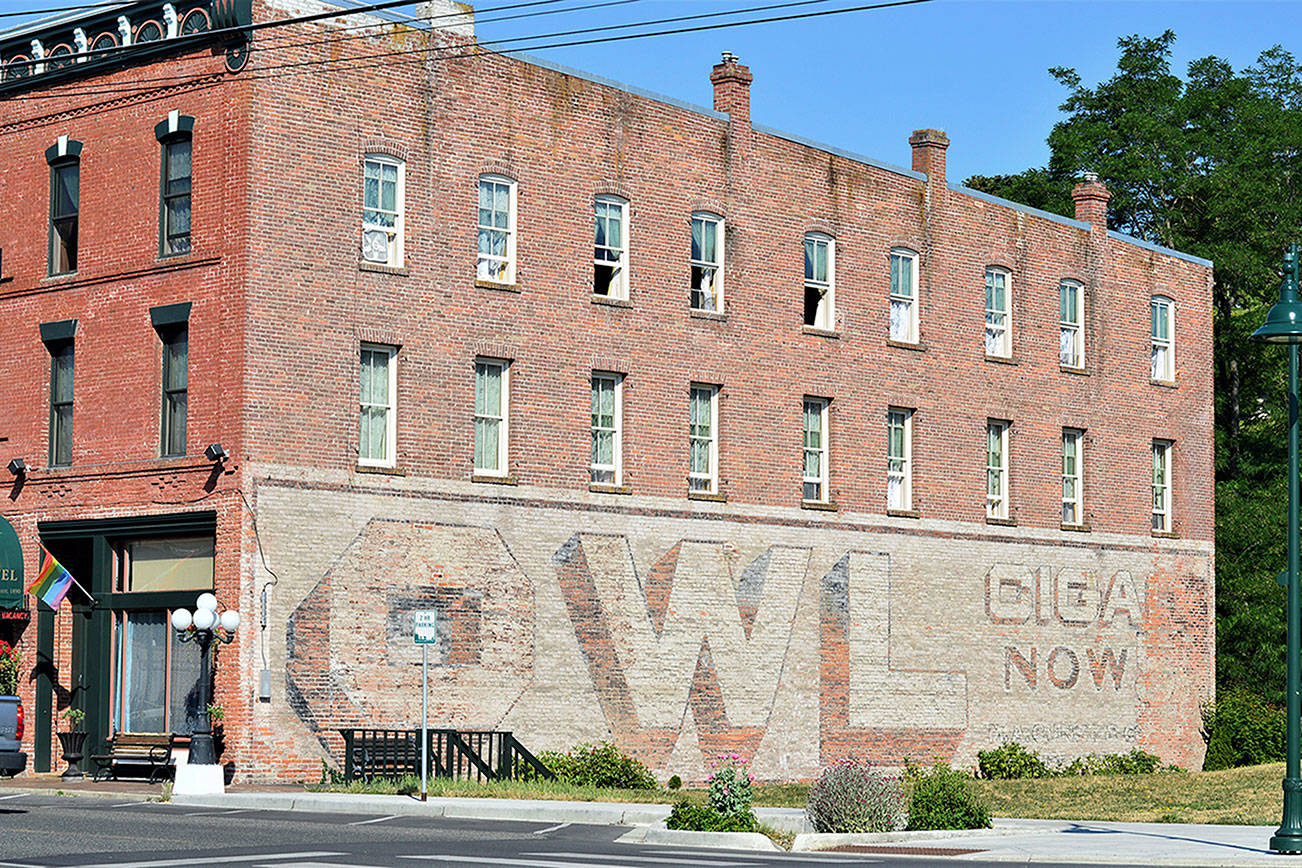 The Owl Cigars mural is one of many stops on the Jefferson County Historical Society’s “Vanishing Murals” walking tours starting in July. Owl’s message was among the company’s numerous advertisements on walls across the country. (Diane Urbani de la Paz/Peninsula Daily News)