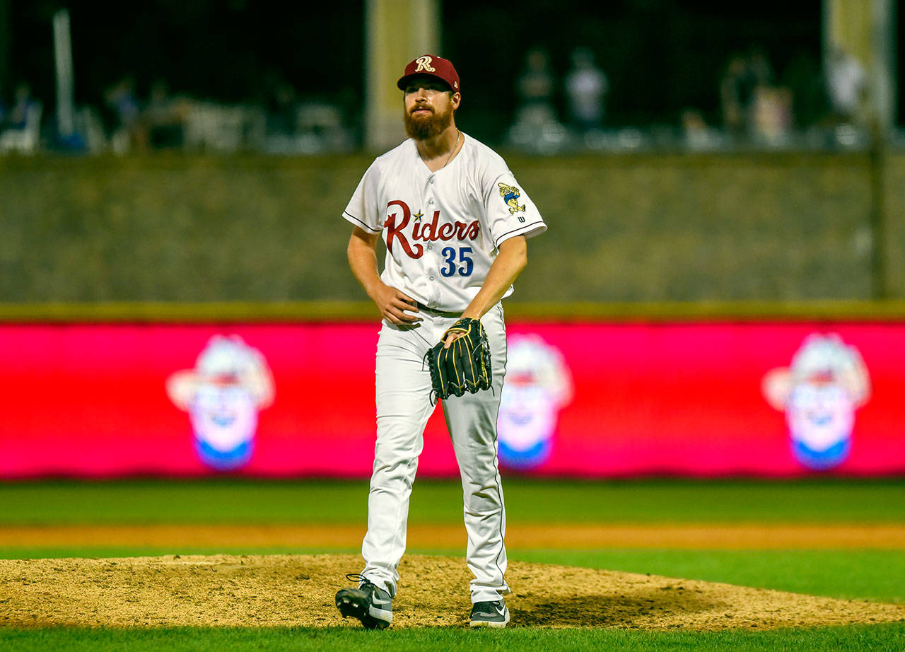 Cole Uvila, a 2012 Port Angeles High School graduate, is performing well as a pitcher at Double-AA Frisco, posting a 2.21 ERA with eight saves in eight opportunities this season. Frisco RoughRiders right hand pitcher Cole Uvila (35) at Riders Field in Frisco, Texas Friday, June 4, 2021. (Photo by Zach Del Bello/Frisco RoughRiders)