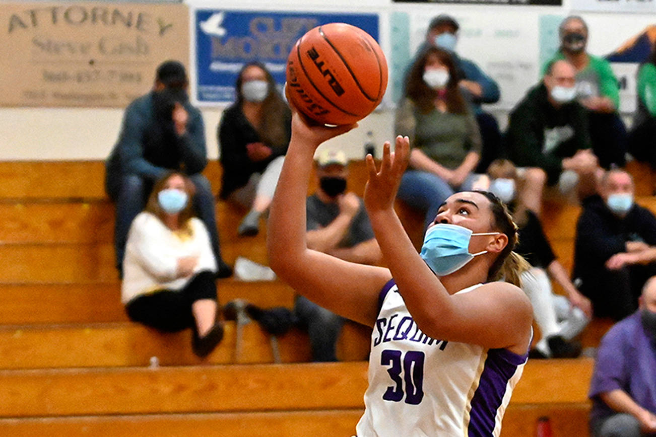 Michael Dashiell/Olympic News Group
Sequim's Jayla Julmist rises for a fast-break layup during a game with Port Angeles on Wednesday. Julmist recorded a double-double with 16 points and 14 rebounds.