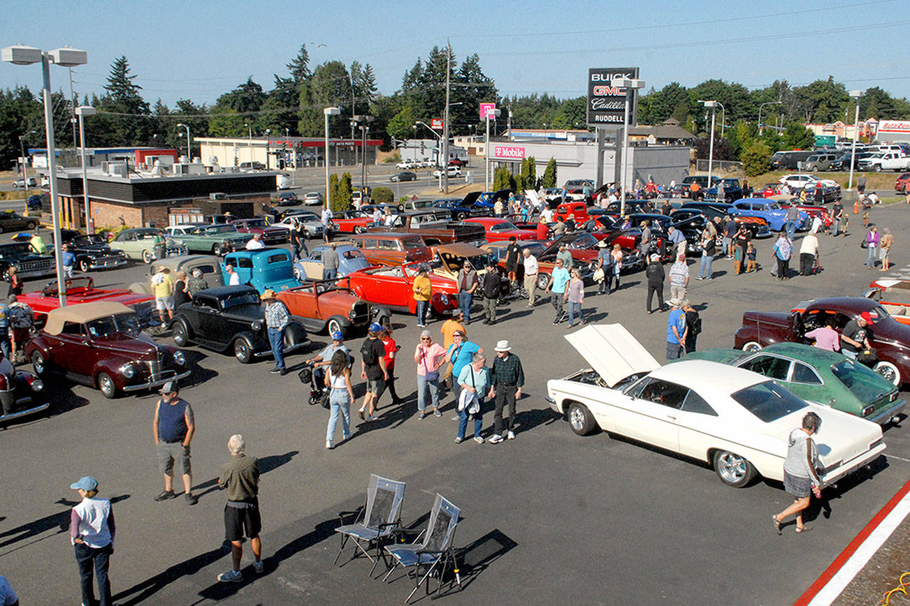 Keith Thorpe/Peninsula Daily News
Vintage cars stand on display at Friday night's Ruddell Cruise In at Ruddell Auto Plaze in Port Angeles.