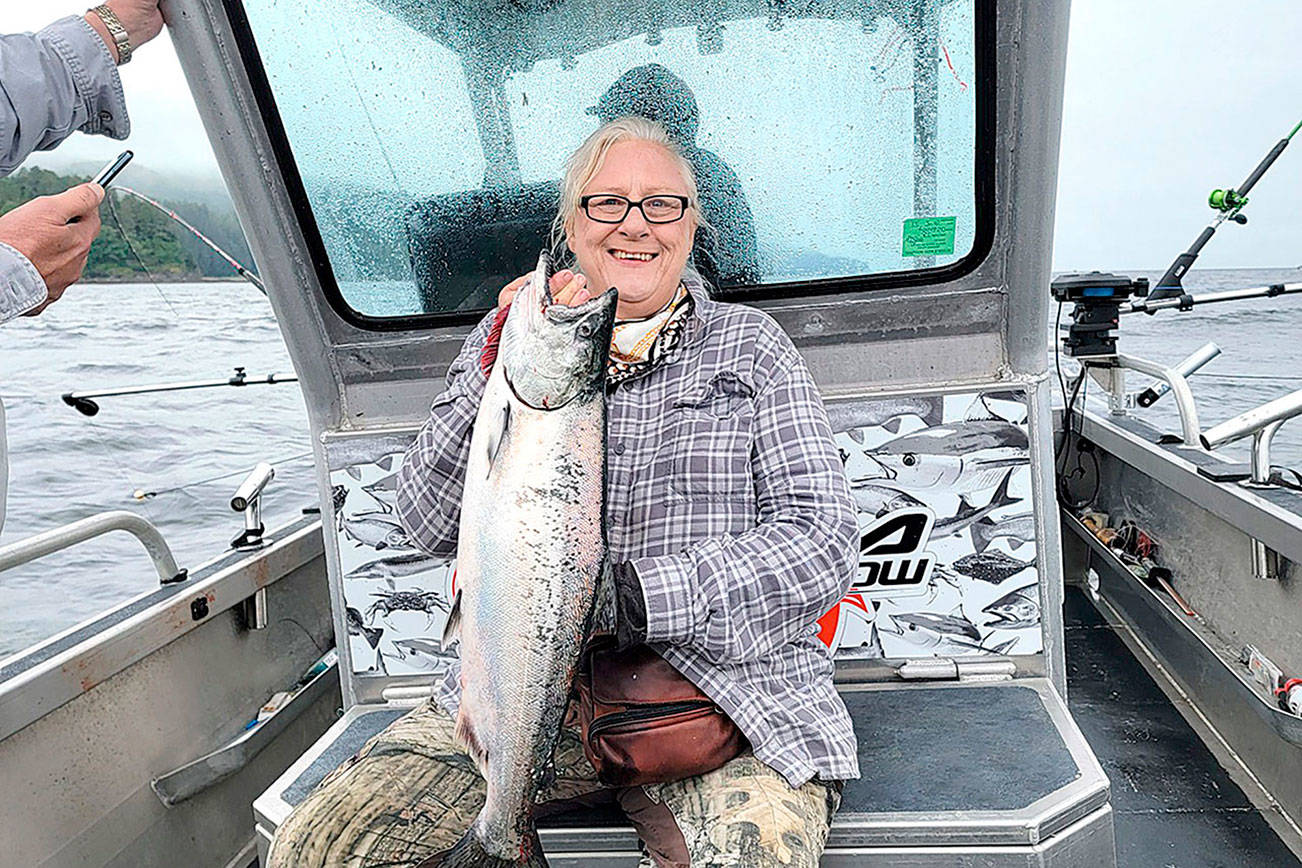 The Sequim Chapter of Salmon For Soldiers is planning a large salmon fishing trip for veterans and active-duty military off Sekiu on Aug. 15. Lori Hester, a former Army nurse, limited on salmon Saturday in an outing with the group.