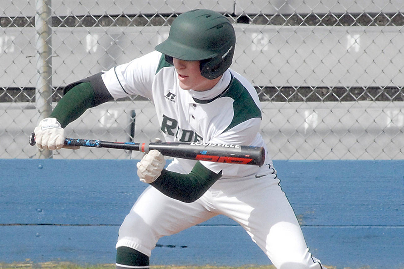 Keith Thorpe/Peninsula Daily News
Port Angeles' Wyatt Hall attempts to bunt in his opening at-bat against North Mason in March at Port Angeles Civic Field. Hall has signed a letter of intent to play baseball at Skagit Valley College in Mount Vernon.