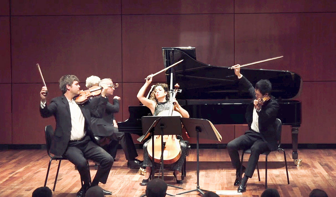 Music on the Strait cofounders James Garlick, left, and Richard O’Neill, right, perform with New York City-based pianist Jeremy Denk and Southern California cellist Ani Aznavoorian, center, in the inaugural festival three years ago at Peninsula College’s Maier Performance Hall. The performers will reunite this August for the 2021 Music on the Strait. (Photo courtesy of Music on the Strait)