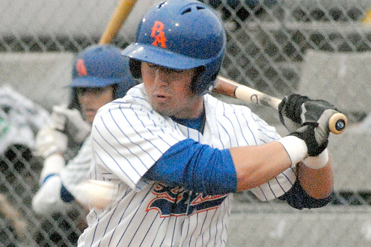 Keith Thorpe/Peninsula Daily News
Port Angeles native and Lefties outfielder Ethan Flodstrom watches a ball sail past him as he bats in the second inning against Walla Walla last week at Civic Field.