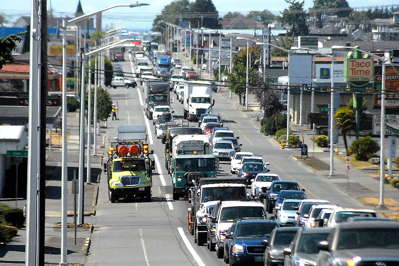 Traffic backs up on East First Street in Port Angeles on Tuesday, the result of lane closures at Golf Course Road, which is being repaved from East First Street to East Fifth Street. At times, traffic was snarled as far as downtown Port Angeles with backups on many side streets and arterials. Construction on Golf Course is expected to continue through Friday. (Keith Thorpe/Peninsula Daily News)