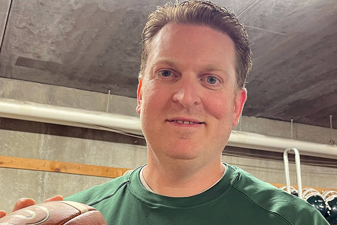 Dustin Clark, a Port Angeles boys basketball assistant and a two-time state champion back at Elma High School, has been selected to coach the Roughrider football team.