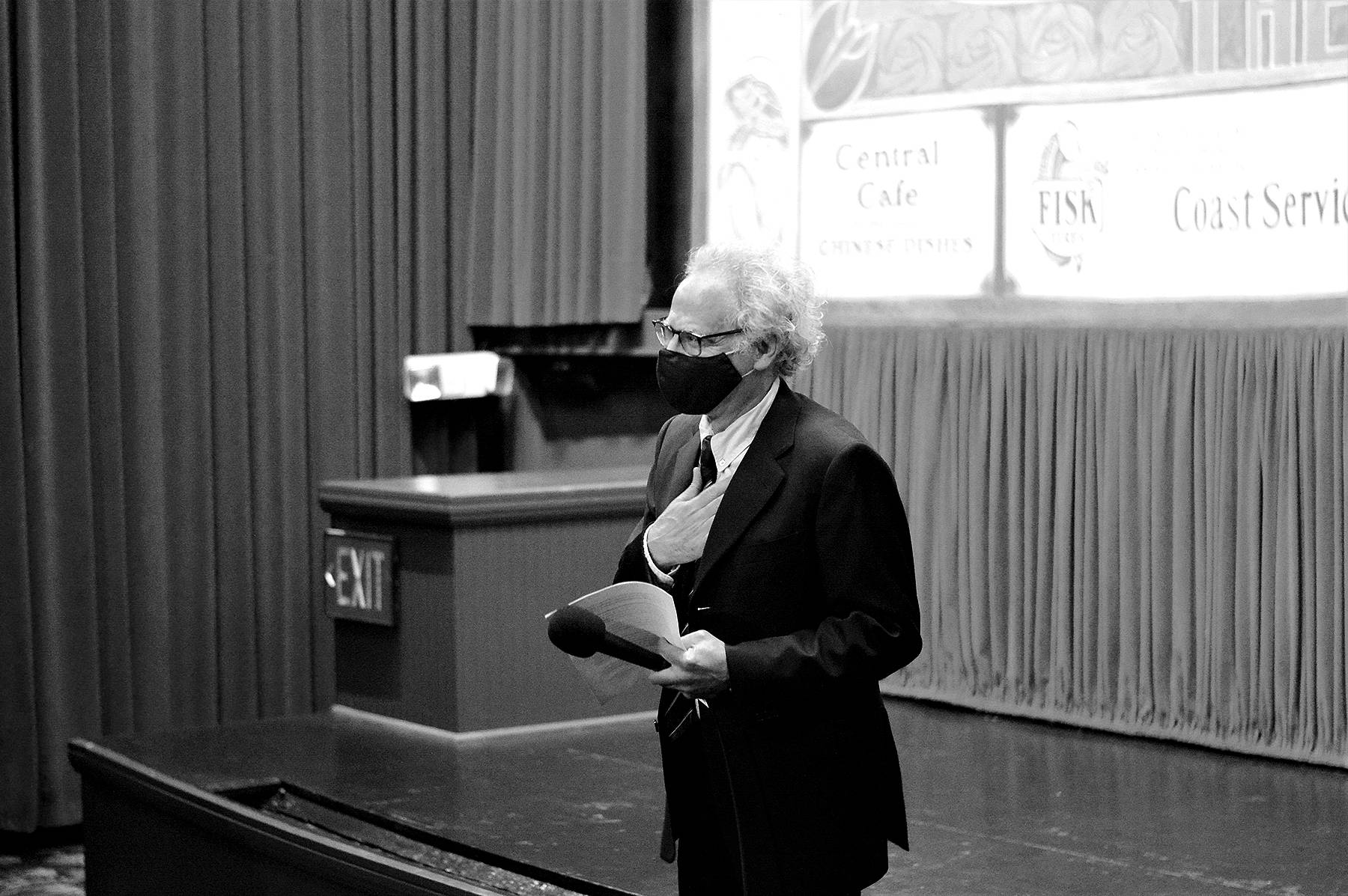 Receiving a standing ovation from the audience at the Rose Theatre on Wednesday night, owner Rocky Friedman expressed his gratitude to supporters who waited 499 days for the downtown Port Townsend cinema to reopen. Friedman also introduced his mother Miriam, 101, during his speech before the showing of the film “The Truffle Hunters,” from Italy. The two-screen movie house is using a MERV-13 air filtration system and selling two-thirds of the seats for each screening. Diane Urbani de la Paz/Peninsula Daily News