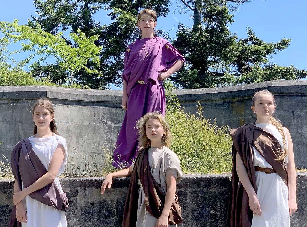 Port Townsend eighth-grader Peter Sanok, top, plays the title role in “Timon of Athens,” the movie to screen this week at Chimacum’s Finnriver Farm & Cidery. Costarring are, from left, eighth-graders Auden Darrock and Anna Munn and seventh-grader Sierra Douglas. (Photo by Maggie Kelley)