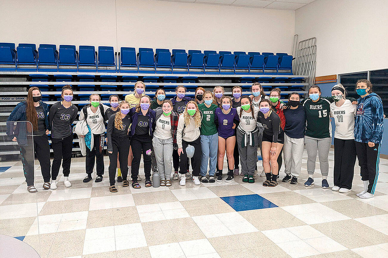 The Port Angeles and Sequim volleyball teams celebrate their showings at the Monarch Volleyball Tournament held in Longview this weekend.