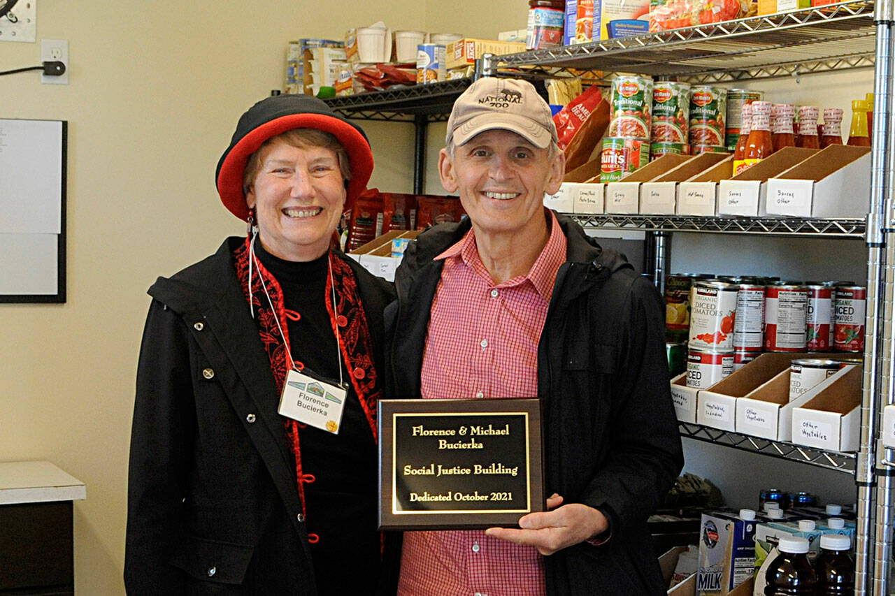 A storage building for the Olympic Unitarian Universalist Fellowship’s Little Free Pantry was named to honor volunteers Florence and Michael Bucierka of Sequim. Matthew Nash/Olympic Peninsula News Group