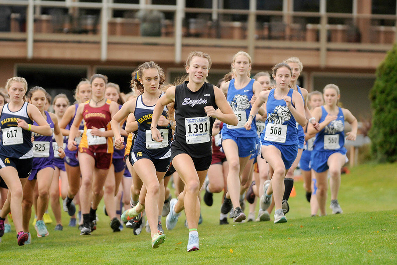 Michael Dashiell/Olympic Peninsula News Group
Sequim's Riley Pyeatt was all smiles at the start of the Olympic League Cross Country Championships at The Cedars at Dungeness Golf Course on Thursday.