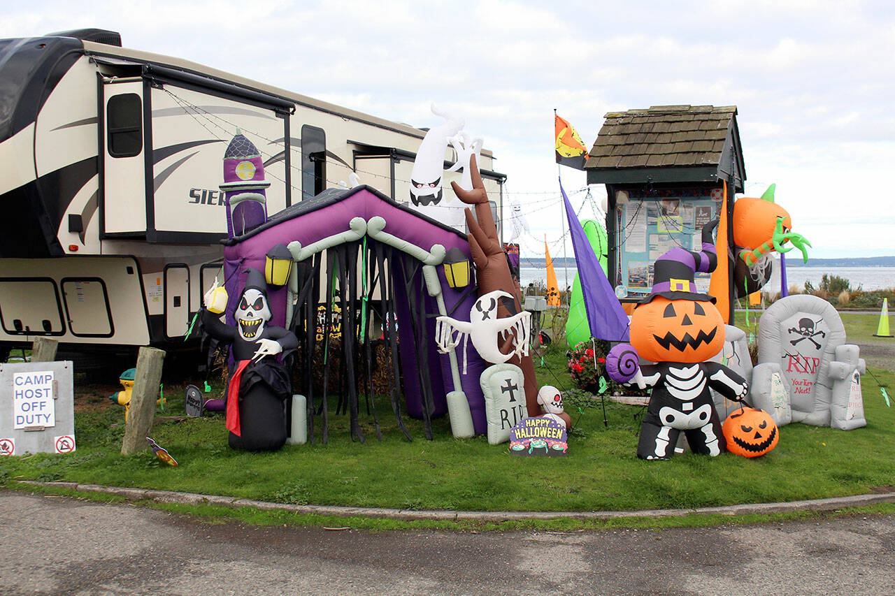 The camp host for the Point Hudson campground has their corner of the RV park decorated for Halloween. While many annual Halloween events have been cancelled this year due to the continuing COVID-19 pandemic, the health officer for North Olympic Peninsula believes that normal trick-or-treating for kids can be done safely tonight. (Zach Jablonski/Peninsula Daily News)