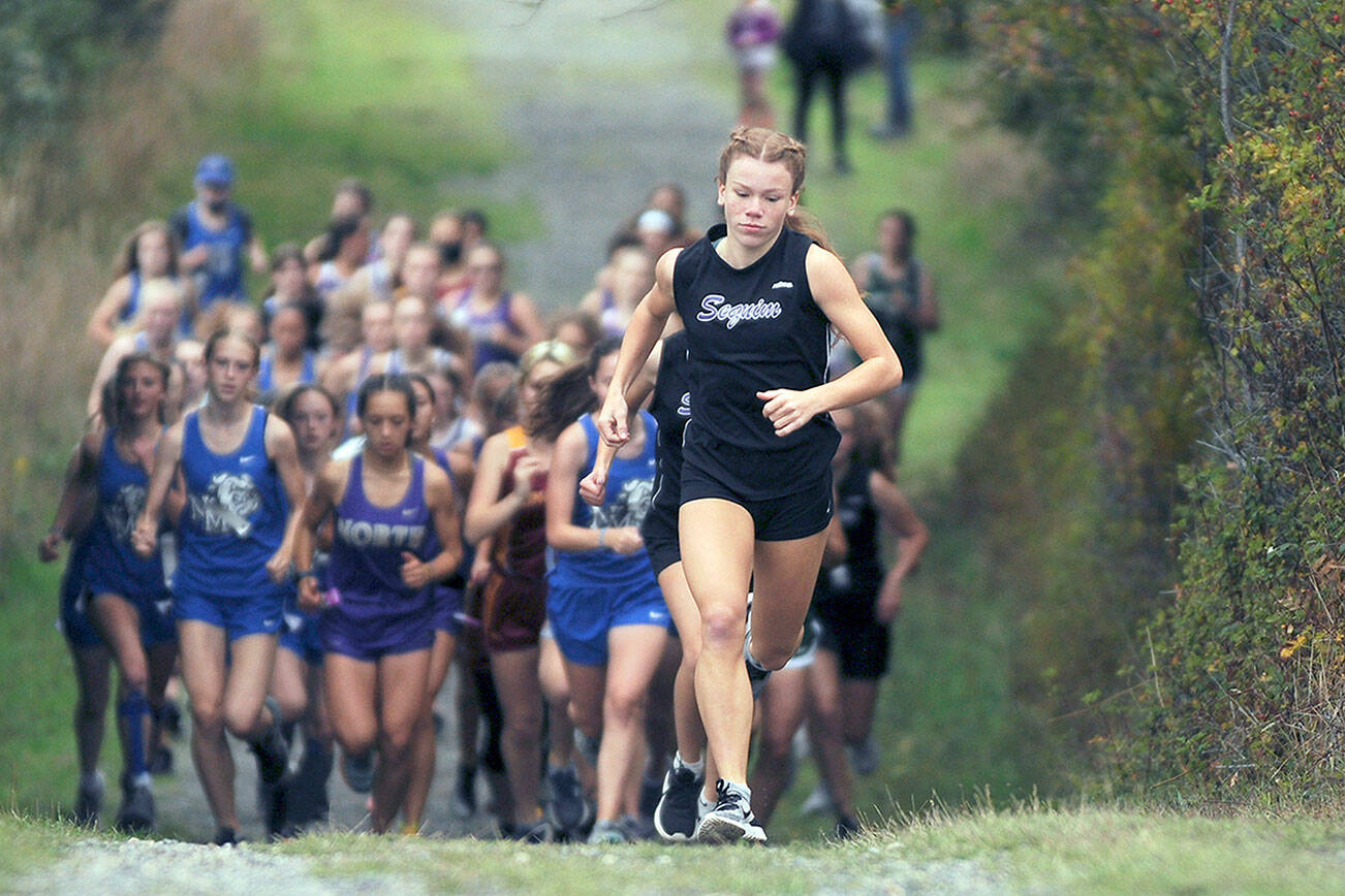 Michael Dashiell/Olympic Peninsula News Group
Sequim's Riley Pyeatt will race at her third WIAA Class 2A State Cross Country Championship at Sun Willows Golf Course in Pasco on Saturday.