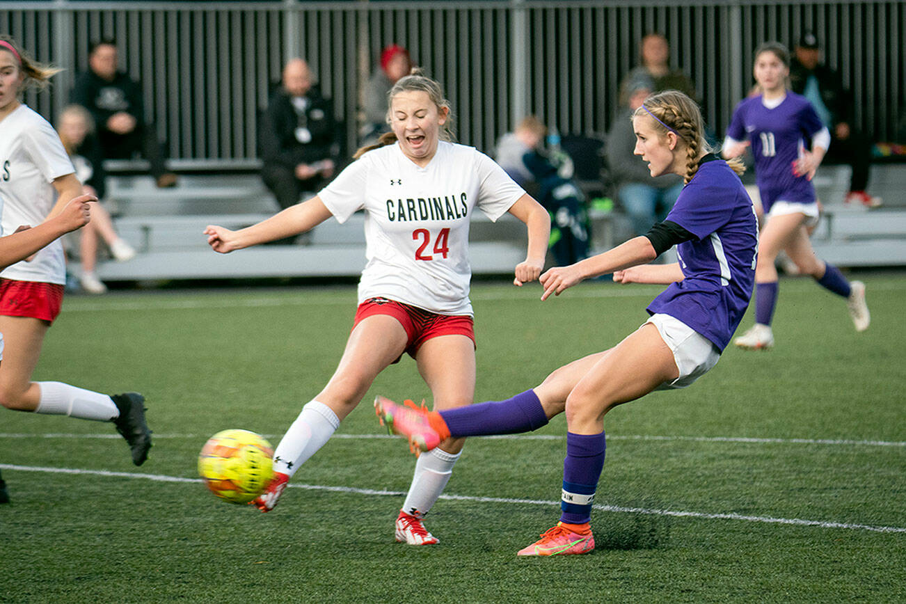 Jesse Major/for Peninsula Daily News
Sequim's Hannah Wagner boots a shot on goal during the Wolves 3-1 Bi-District Tournament victory over Orting on Thursday at Peninsula College's Wally Sigmar Field.