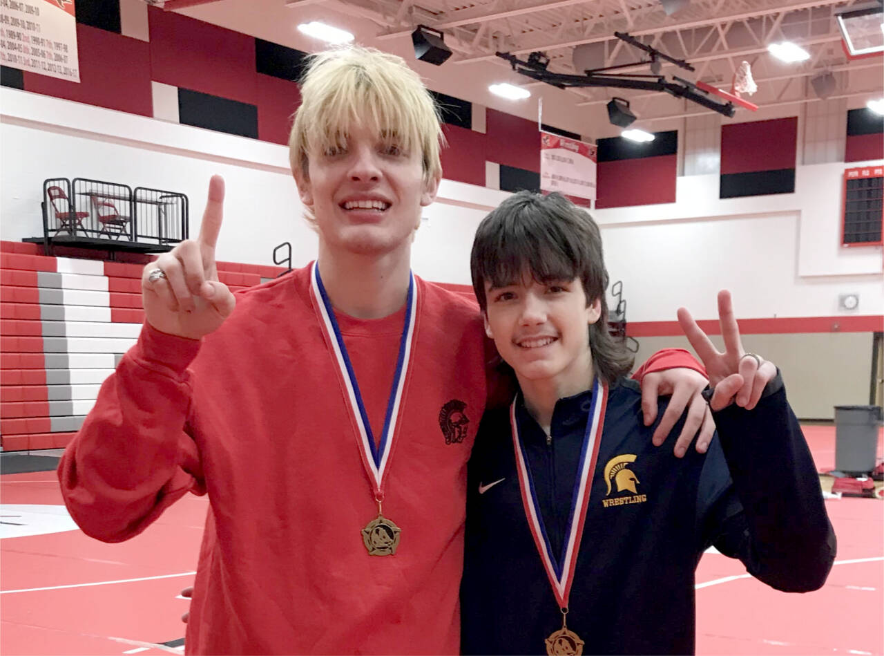 Forks' Jake Weakley, left, and Matthew Montes have won their weight divisions at three straight tournaments through December.