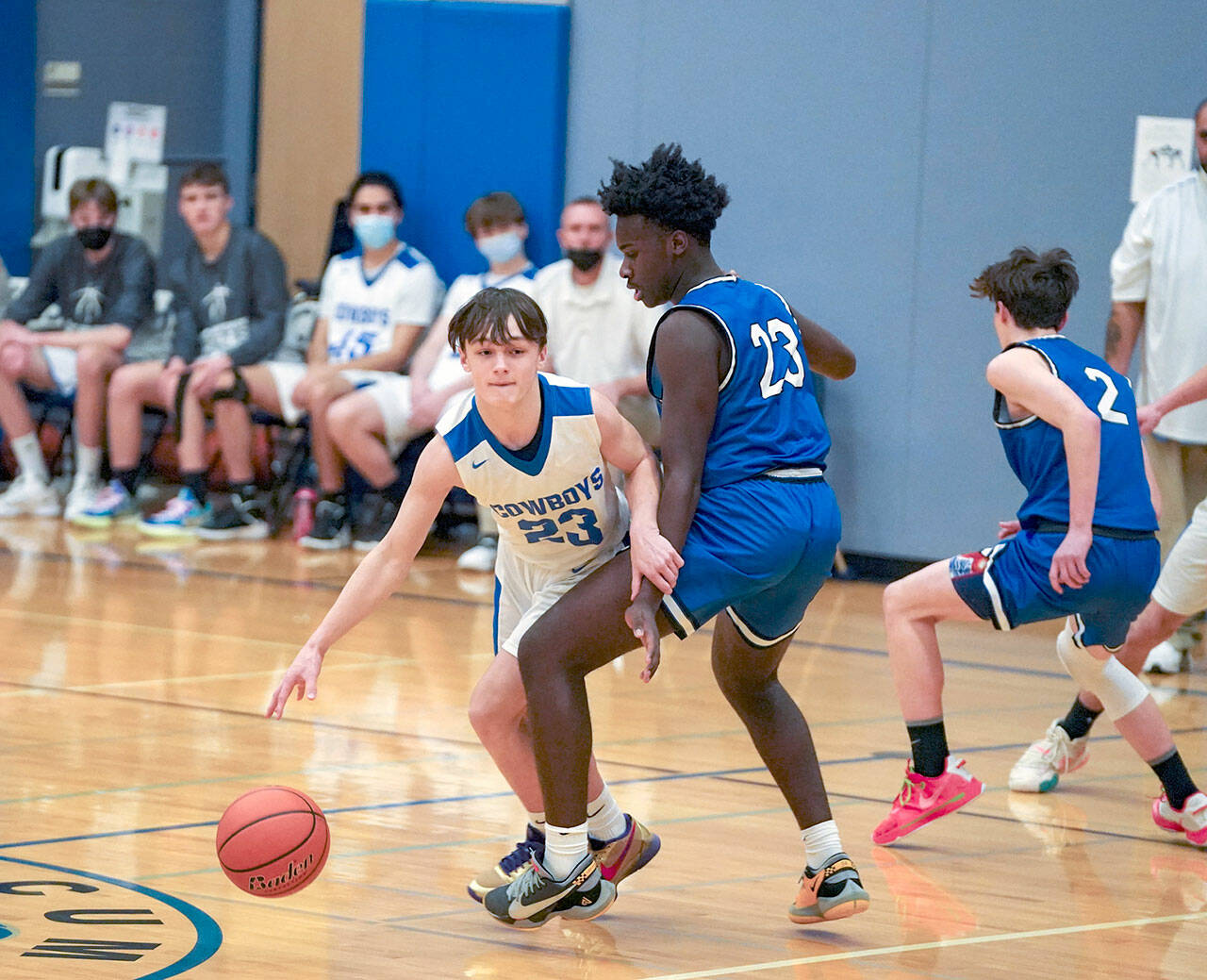 Steve Mullensky/for Peninsula Daily News


East Jefferson’s Brody Moore pivots around North Mason Bulldog Clay Alverts during a spirited home game on Tuesday in Chimacum.