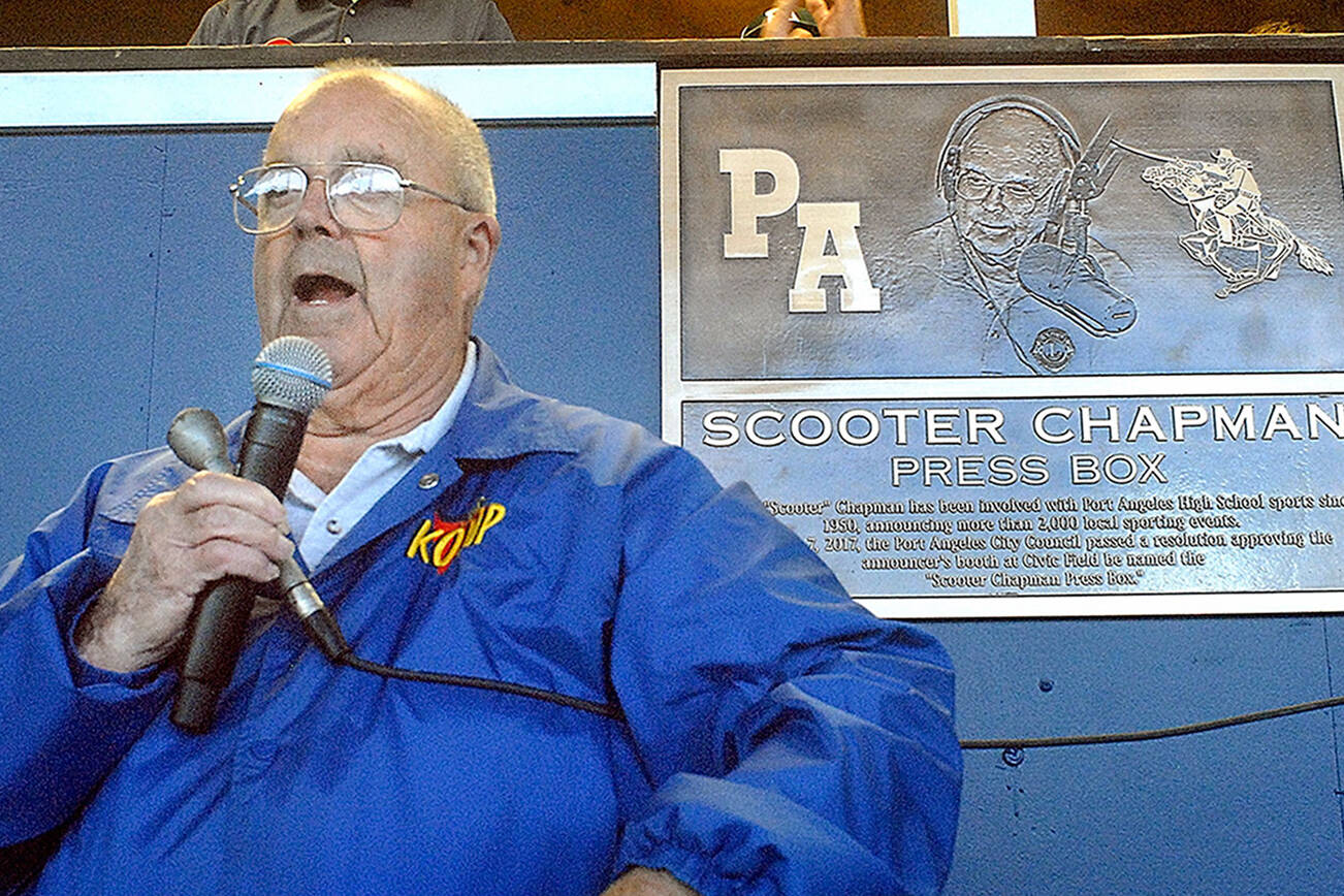 Keith Thorpe/Peninsula Daily News
KONP Radio sportscaster Howard "Scooter" Chapman speaks to the crowd after the 2017 unveiling of a plaque naming the Civic Field press box the Scooter Chapman Press Box in recognition of his devotion to prep sports since the early 1950s. Chapman is retiring after a lifetime in broadcasting.