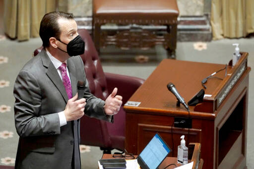 Democratic Senate Majority Leader Andy Billig, D-Spokane, speaks on the floor of the Senate on Wednesday at the Capitol in Olympia during debate on a measure that would delay implementation of a long-term care program and the payroll tax that pays for it. The Senate passed the measure, which was passed by the House last week, and Gov. Jay Inslee is expected to sign the measure on Friday. (Ted S. Warren/The Associated Press)