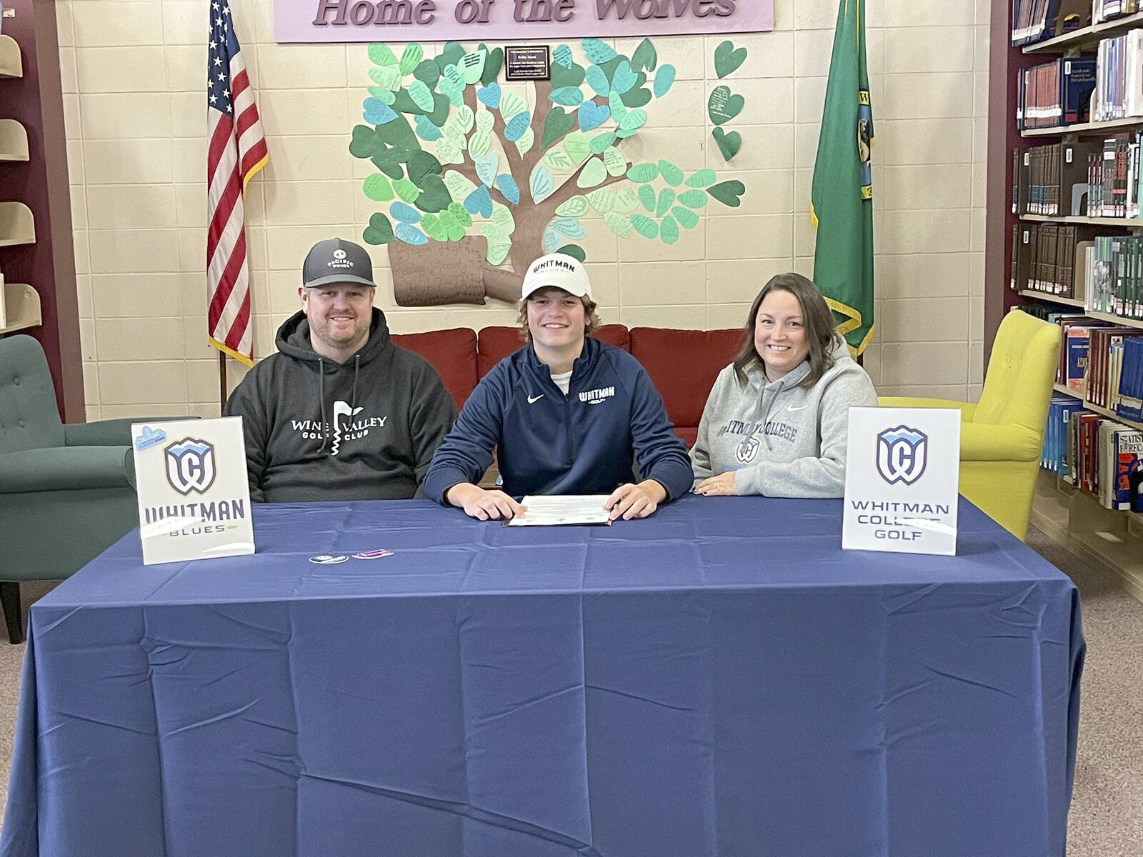 For ASB-PDN-220130
Sequim High School is proud to recognize Ben Sweet as he signs a letter of intent to join the men’s golf Team at Whitman College in Walla Walla.  Ben is pictured with his father Tyler Sweet and mother Stephanie Sweet. Whitman competes at the NCAA Division III level and has recently been ranked in the division's top 25 programs.