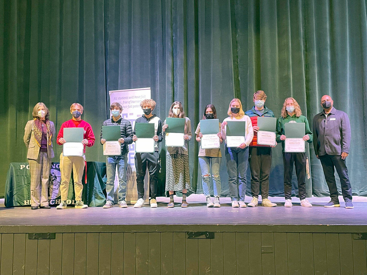 Pictured, left to right, Annette Wendel, board member; Academic Achievement awardees James Saskowsky, Miles Wait, Damon Gunderson, Emi Halberg, Kimberly Thompson, Gillian Wolfe, Adam Weller and Joshua Gavin; and Ray Chirayath, board president.