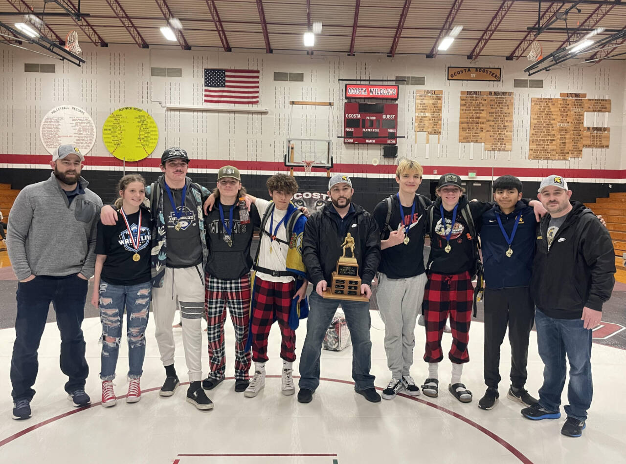 Courtesy photo
Forks individual district champions celebrates their titles and Forks' team title. From left, are assistant coach Conner Nielson, Peyton Johnson, Hayden Queen, Dalton Kilmer, Jesus Garcia-Dominguez, assistant coach Daniel Frishkorn, Jake Weakley, Conner Demorest, Abraham Montealegre and head Coach Kyle Weakley.