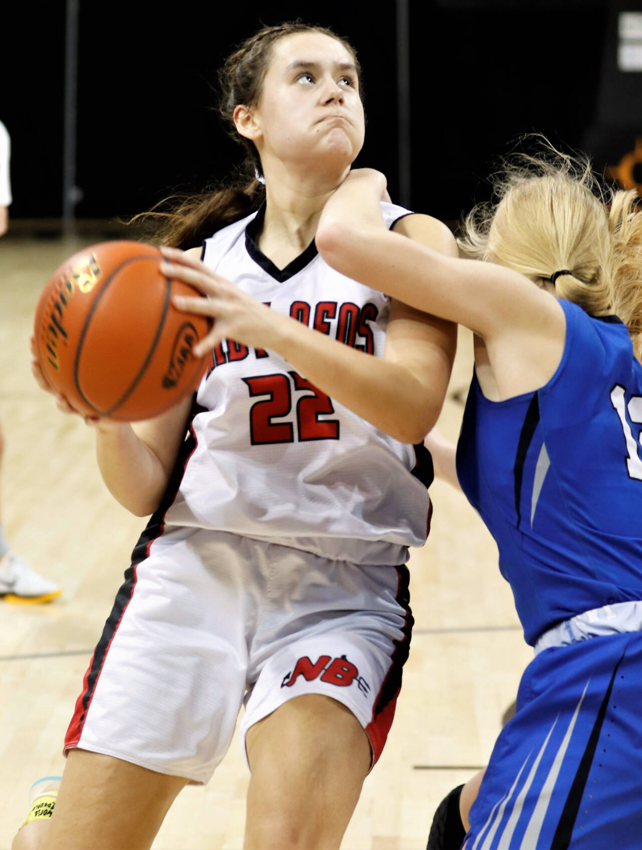 Neah Bay’s Amber Swan drives to the basket Thursday against Wilbur-Creston-Keller in the 1B state quarterfinals. Swan scored 21 points in Neah Bay’s 59-47 win. (Roger Harnack/Cheney Free Press)