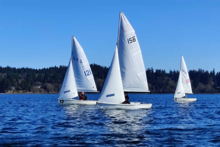 Keith Dahlin photo The Port Angeles High School sailing team competed off Silverdale earlier this month. Boat No. 121 is skippered by Luna Hutchin with crewmate Charlie Kasten, boat No. 156 is skippered by Ozzy Minard with crewmate Ella Shultz and boat No. 122 is skippered by Elliot Dahlin Skipper with cremate Fern Knobel.