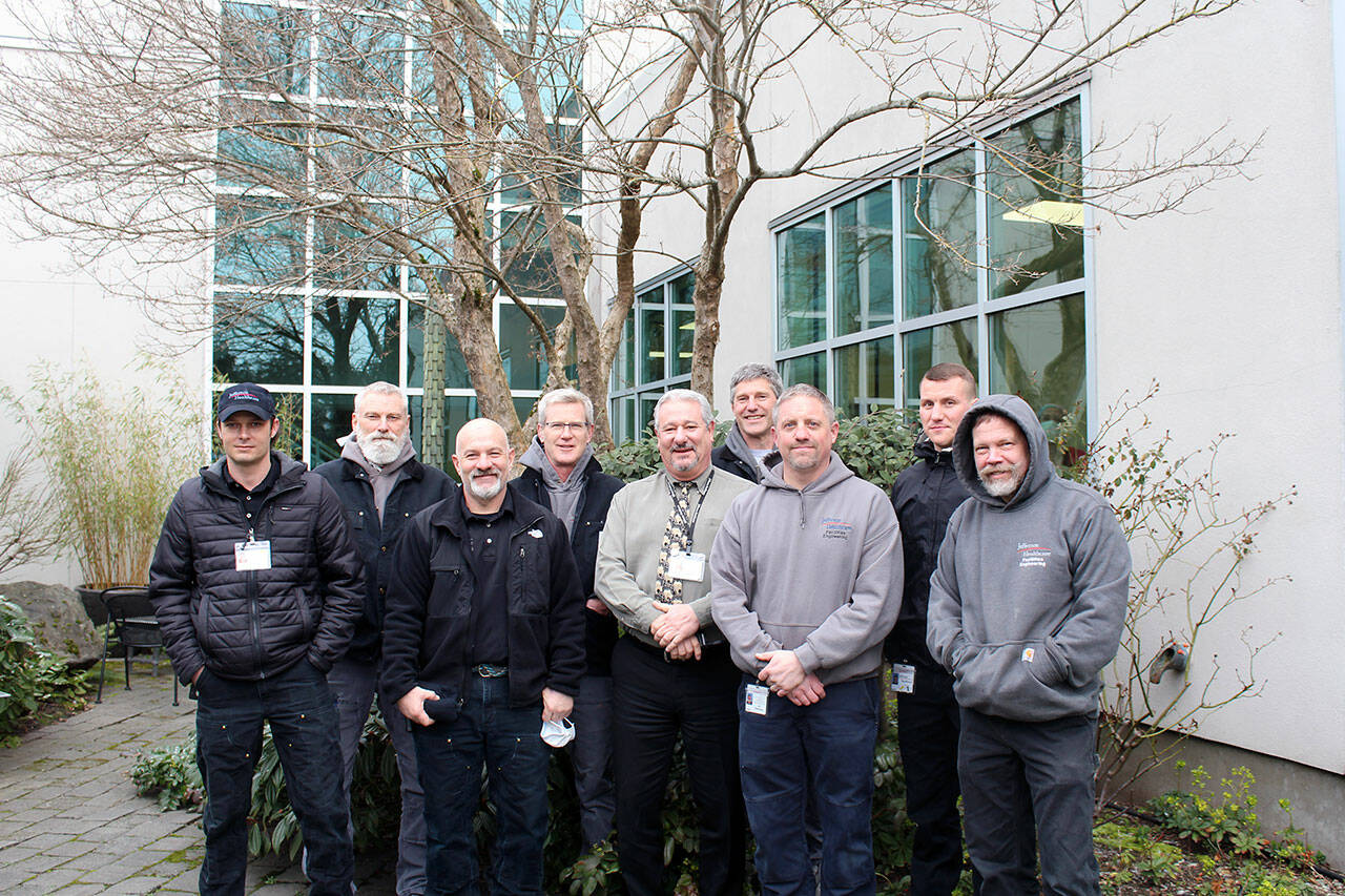 Jefferson Healthcare facilities staff Matthew Brock-Farrington, left, Terry Hoffman, Jarrod Johnson, Sean Mugrage, Chris O’Higgins, Ross Taylor, James Dunn, Shaun Muck and Steve Boruch earned and Energy Star certification with a score in the 97th percentile. (Jefferson Healthcare)