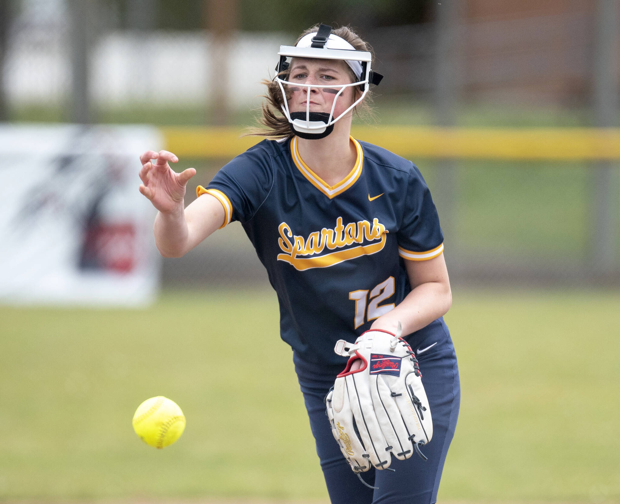 Forks’ Chloe Gaydeski-St. John delivers a pitch against Pe Ell/Willapa Valley on Friday in Pe Ell. The Spartans’ three-game win streak was snapped in a doubleheader sweep by Pe Ell/Willapa Valley, the top team in the Pacific 2B League. (Eric Trent/The Chronicle)