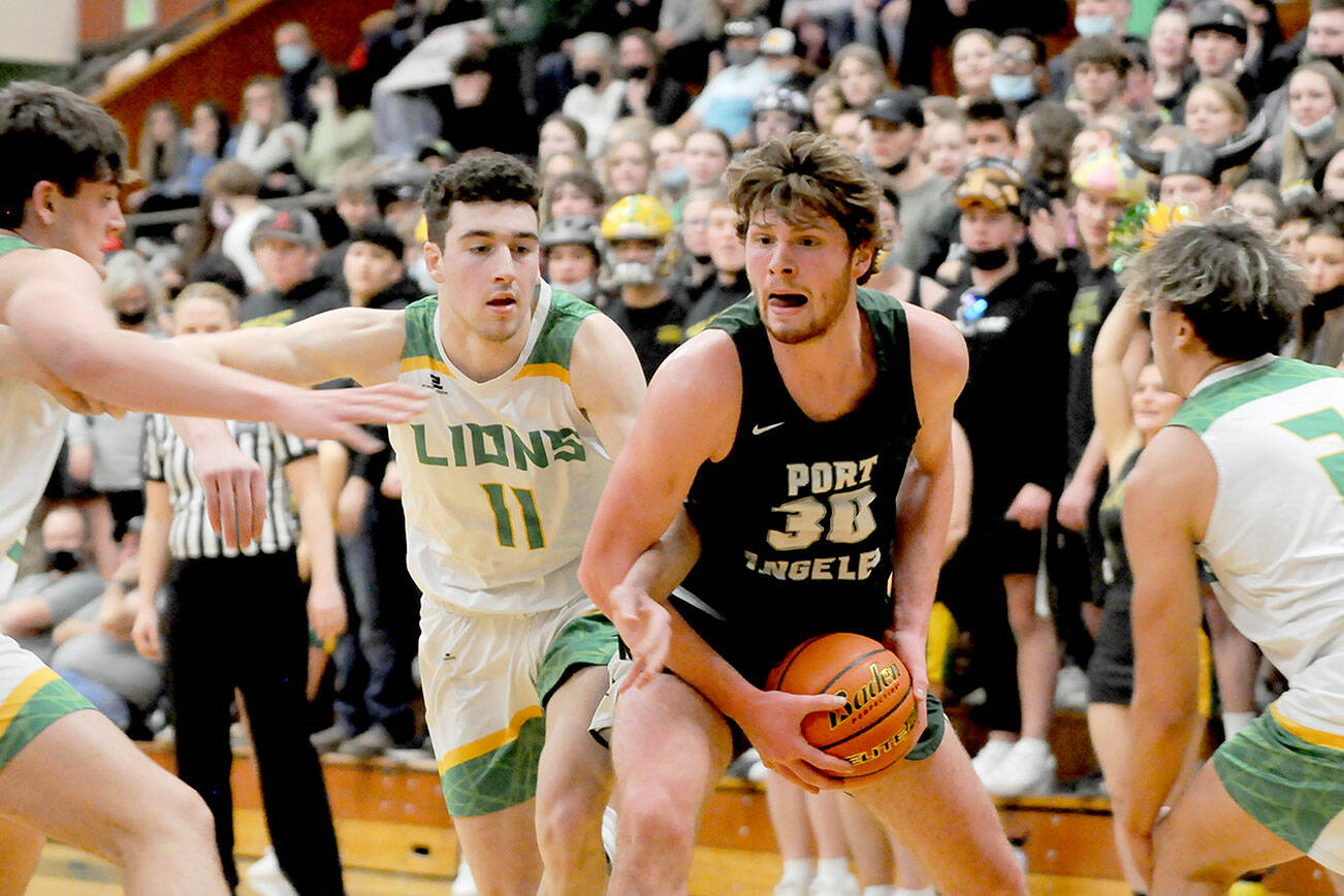 Michael Dashiell/Olympic Peninsula News Group
Port Angeles' Wyatt Dunning, center, is surrounded by Lynden players during a state regional round game at Mount Vernon High School. Dunning is the All-Peninsula Boys Basketball MVP as selected by the Peninsula Daily News sports staff.