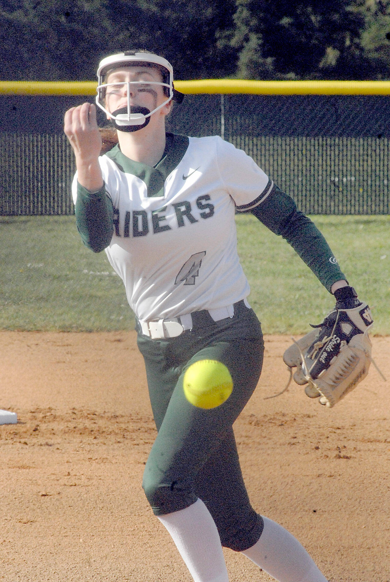 Port Angeles pitcher Teagan Clark throws in the first inning against Bremerton on Tuesday at the Dry Creek athletic complex in Port Angeles. (Keith Thorpe/Peninsula Daily News)